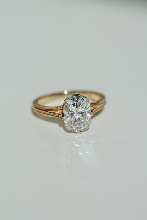 Brilliant cut elongated cushion diamond ring on a white background (view 3)