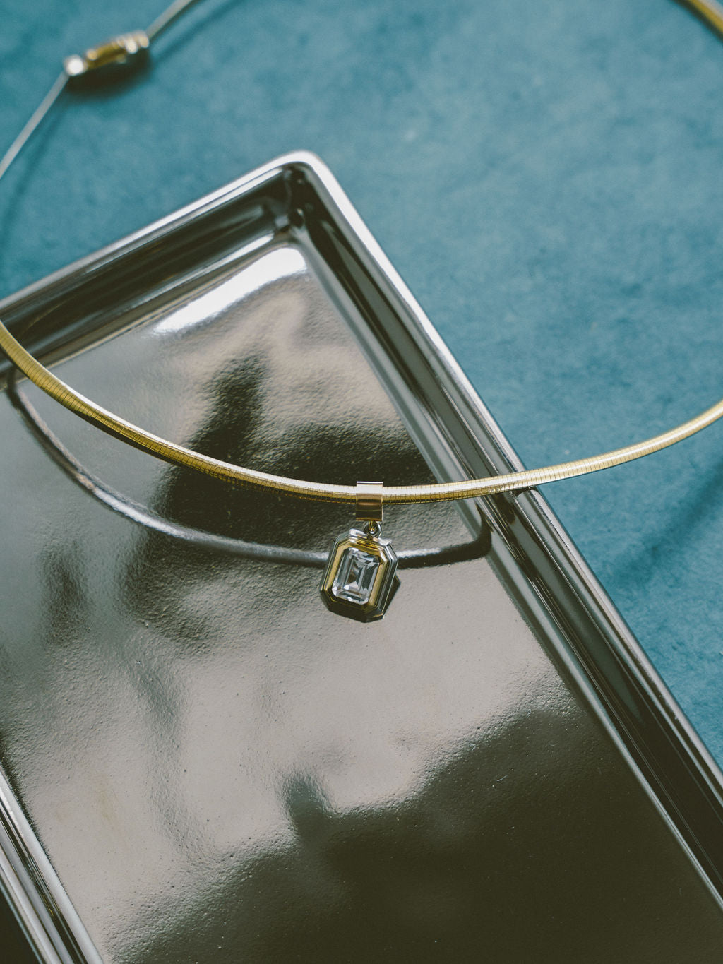 Reversible Omega Necklace | Two-Tone Bezel Emerald