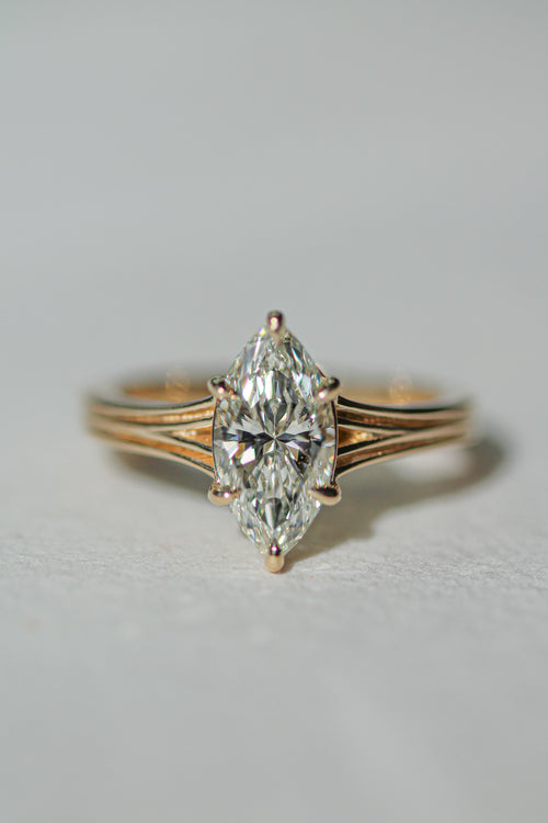 1.32 ct marquise ridged band solitaire