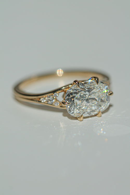 East-west cushion diamond ring