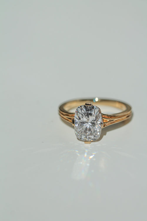 Brilliant cut elongated cushion diamond ring on a white background (view 5)
