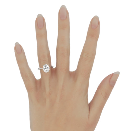 Jake | Custom Oval Solitaire with Knife Edge and Hidden Halo