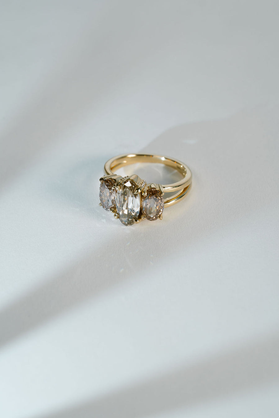 Juned Rind Gale | Champagne Moval three stone – June Rings