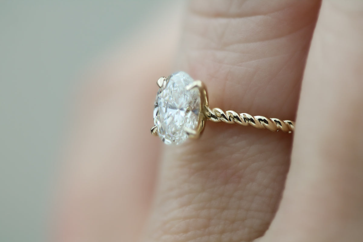 Oval Solitaire Twisted Band