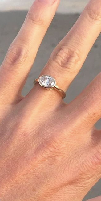 East-West Oval Bezel Engagement Ring