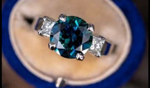 Jesse | Custom Oval Teal Solitaire